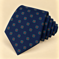 Corbata Azul Marino con Motivos Geométricos Verdes y Rojos