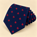 Corbata Azul Marino con Flor de Lis Roja
